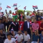 1000 طالب من جامعة عين شمس يشجعون منتخب مصر بالعاصمة الإدارية