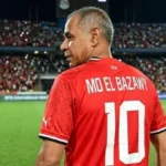 البزاوي يمازح لاعبي منتخب مصر قبل مباراة بلجيكا