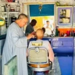 محل حلاقة بقنا يحكي 75 عاماً من الذكريات