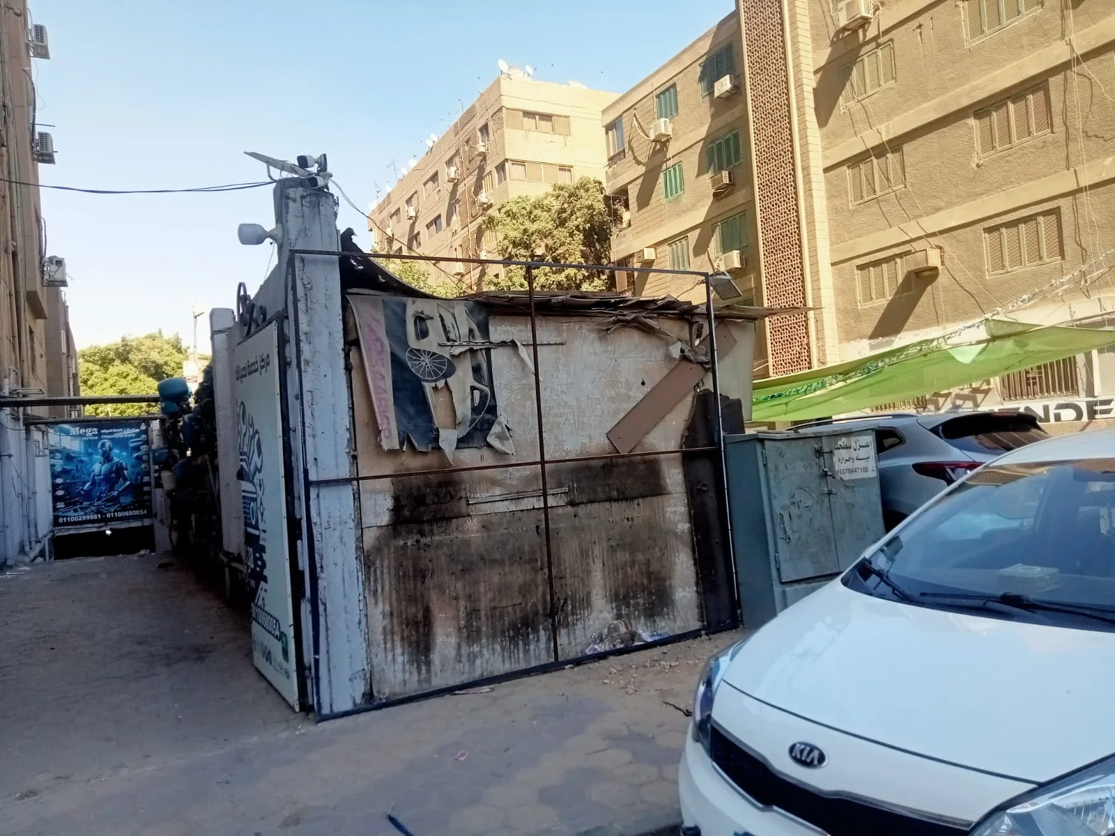 حملة لإزالة الإعلانات المخالفة بالعجوزة
