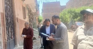 حملة طرق أبواب العجوزة لتسريع التصالح على مخالفات البناء