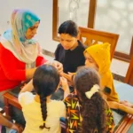 ورش توعية فنية لتمكين الأسرة بالإسكان البديل