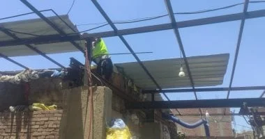 إزالة جمالون مخالف في حي العجوزة