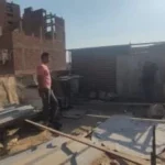 إزالة جمالون مخالف وأعمال بناء غير قانونية في العجوزة